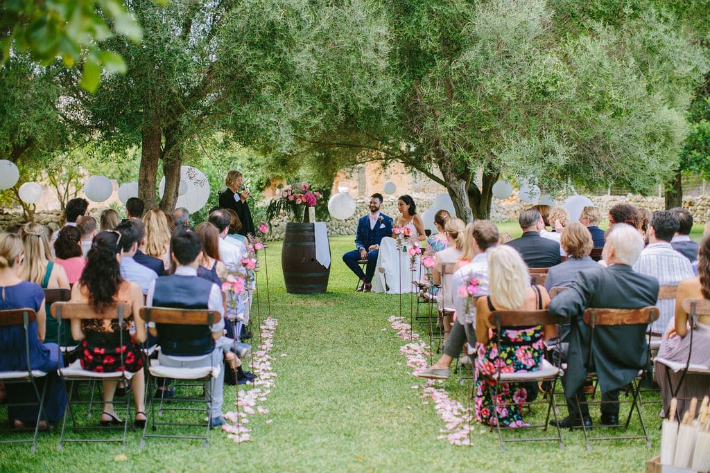 protestant ceremony with rustic decoration at finca alaiar in Mallorca